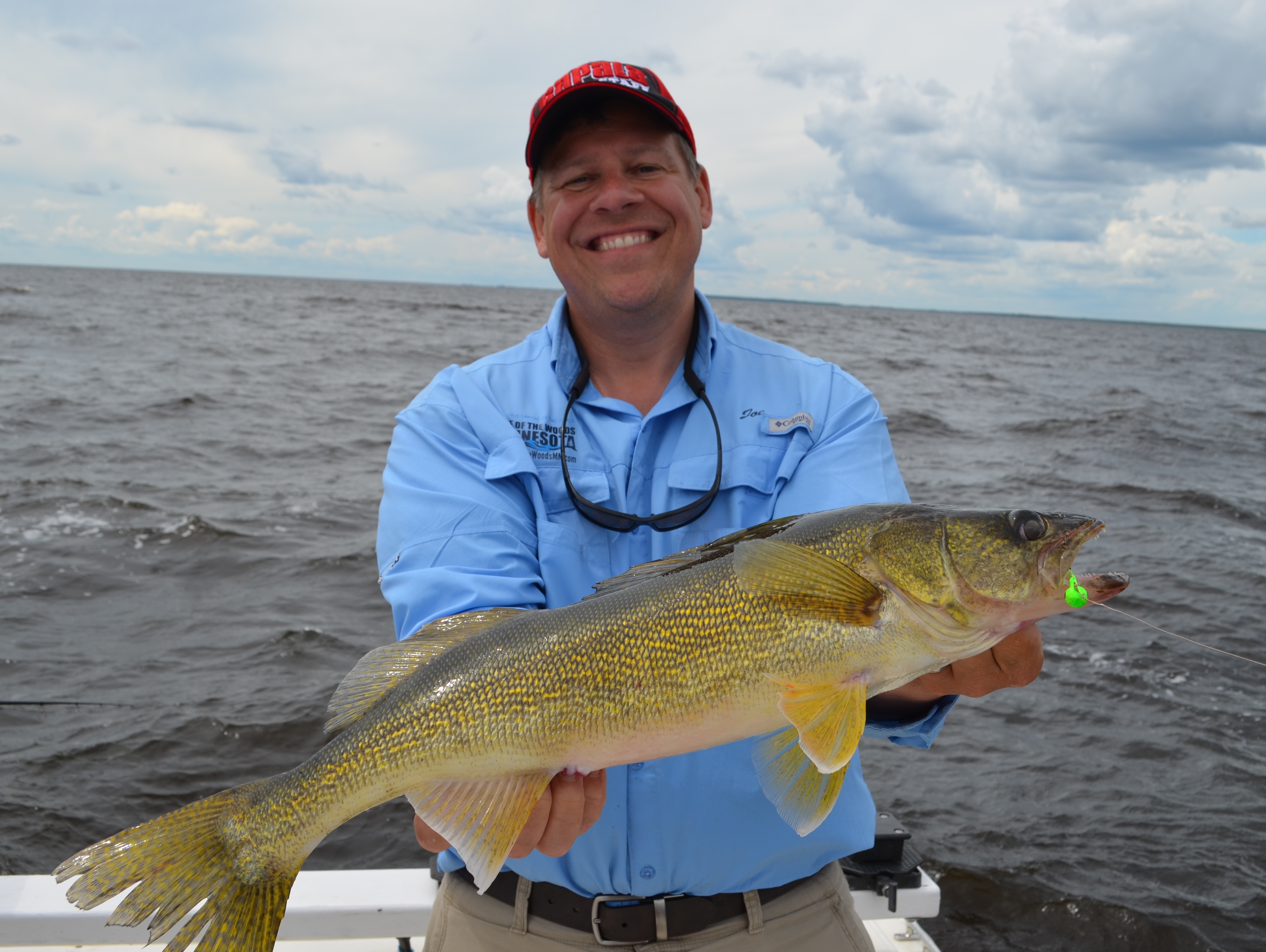 Large walleye, like the one Joe Henry is holding here, can be caught on lures all summer long. 
